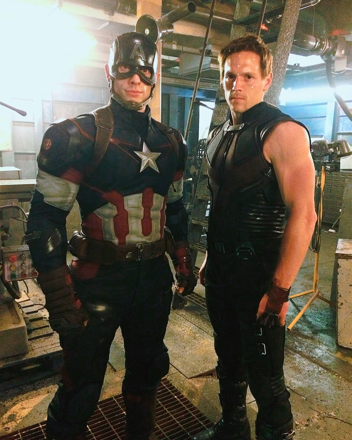 Adam Brashaw in Hawkeye costume beside the Captain America stunt double on Avengers: Age of Ultron.